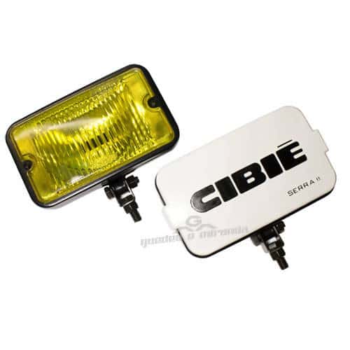 Farol de Milha Preto Lente Raiado Amarelo 708 - Réplica Serra II Com Capa Branca - PAR